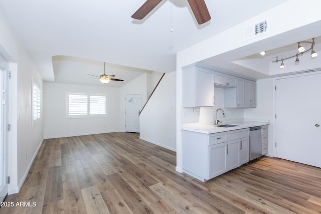 222 W Brown Rd Unit 72, Mesa, AZ 85201 - kitchen with a ceiling fan, a sink, dishwasher, and wood finished floors