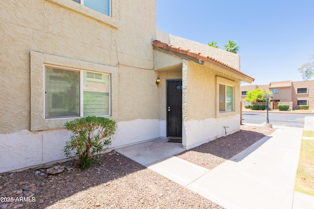 222 W Brown Rd Unit 72, Mesa, AZ 85201 - property entrance featuring stucco siding and a tiled roof