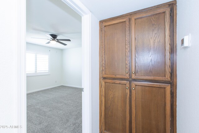 222 W Brown Rd Unit 72, Mesa, AZ 85201 - detailed view of ceiling fan, carpet, and baseboards