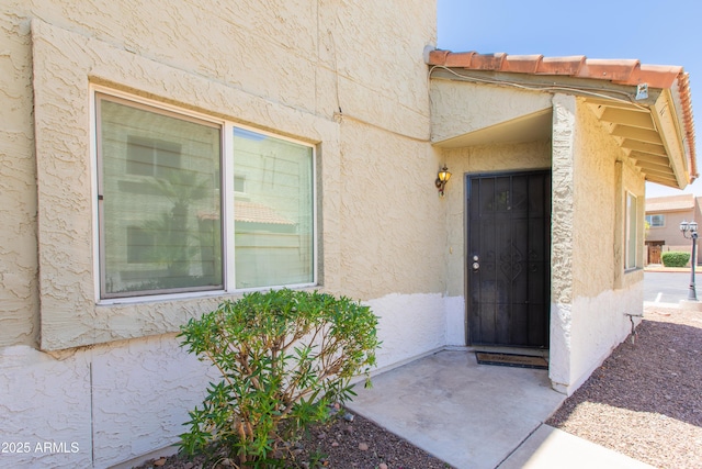 222 W Brown Rd Unit 72, Mesa, AZ 85201 - view of exterior entry with stucco siding
