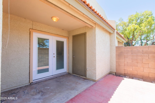222 W Brown Rd Unit 72, Mesa, AZ 85201 - doorway to property with stucco siding, a patio area, a tiled roof, and french doors