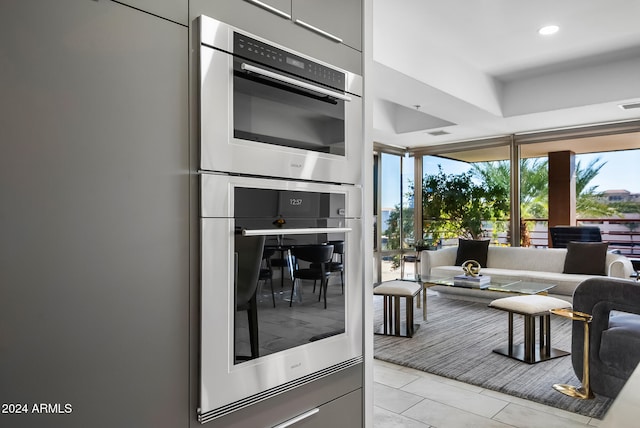 kitchen with light tile patterned flooring and double oven