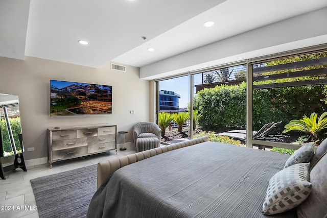 bedroom featuring multiple windows