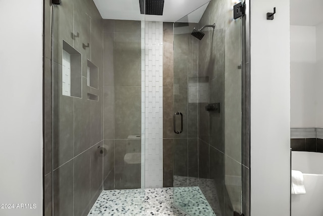 bathroom featuring walk in shower