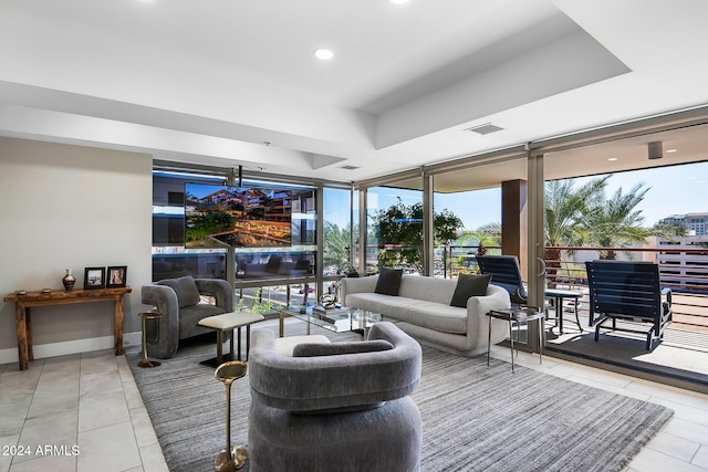 tiled living room with expansive windows