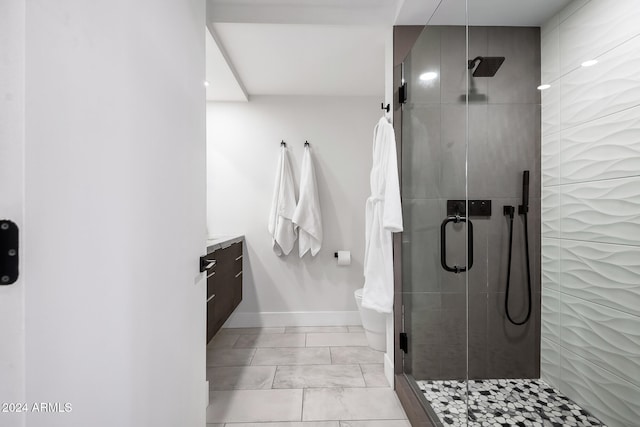 bathroom with vanity and walk in shower