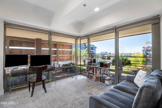 office area with a wall of windows and tile patterned flooring