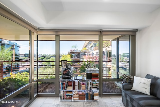 sunroom / solarium featuring a healthy amount of sunlight