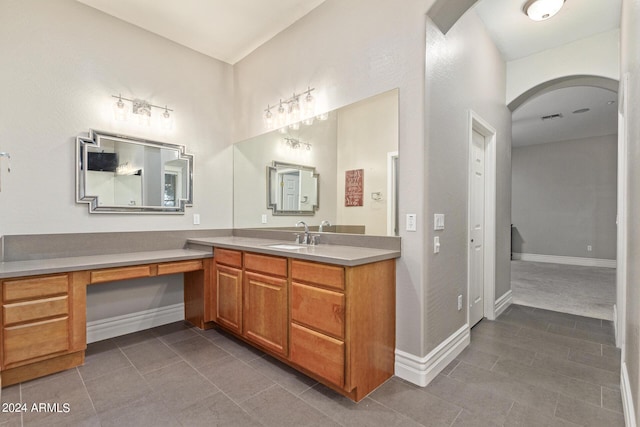 bathroom featuring vanity and tile patterned flooring