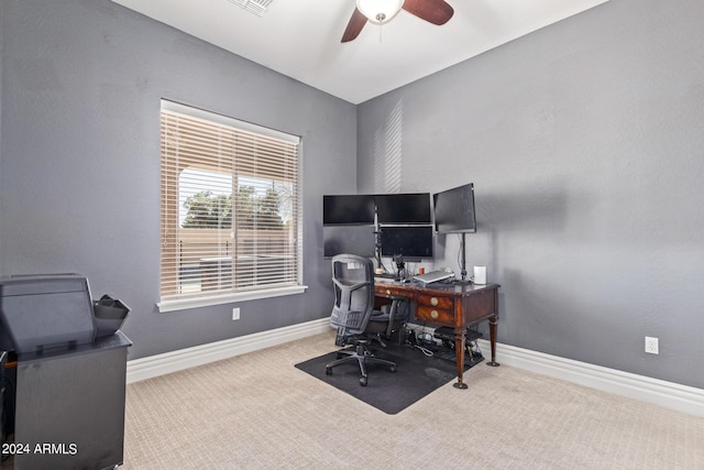 office space featuring carpet and ceiling fan