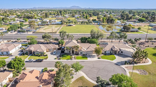 birds eye view of property featuring a mountain view