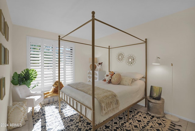 bedroom with tile patterned floors