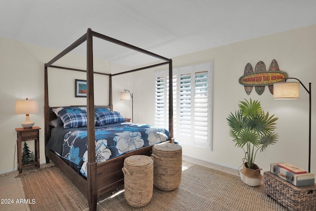 bedroom featuring tile patterned flooring