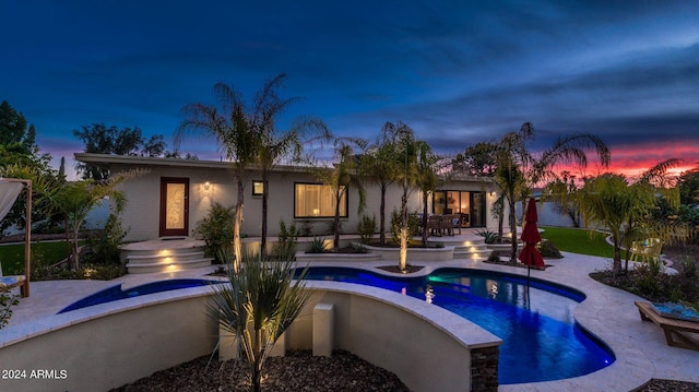 outdoor pool featuring a patio area