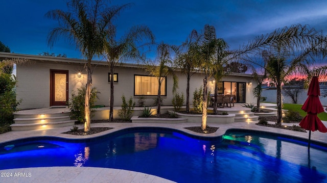 outdoor pool featuring a patio area