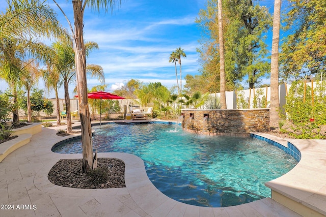 view of pool featuring a patio area, a fenced backyard, and a fenced in pool