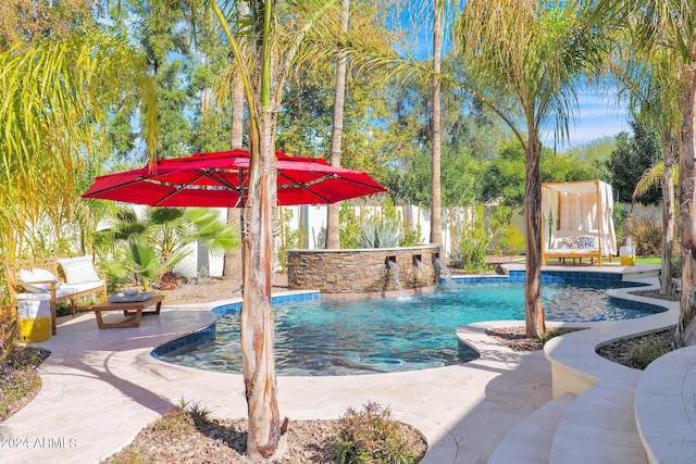 view of swimming pool featuring a patio, fence, and a fenced in pool