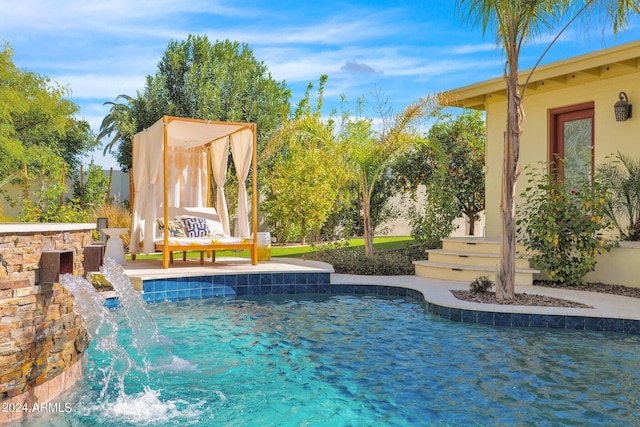 pool featuring a patio area and fence