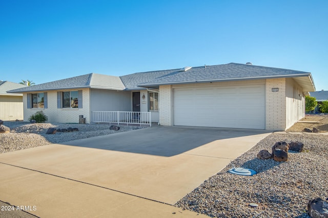 ranch-style home with a garage