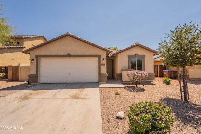 41767 W Somerset Dr, Maricopa, AZ 85138 - view of front of home featuring a garage, driveway, stucco siding, and a tiled roof
