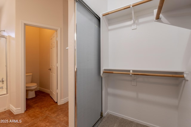 41767 W Somerset Dr, Maricopa, AZ 85138 - spacious closet with tile patterned flooring