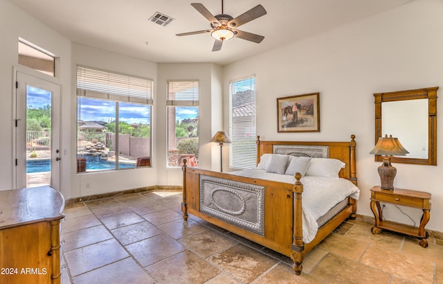 bedroom featuring access to exterior and ceiling fan