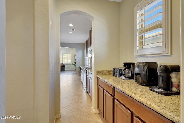 interior space with light tile patterned floors