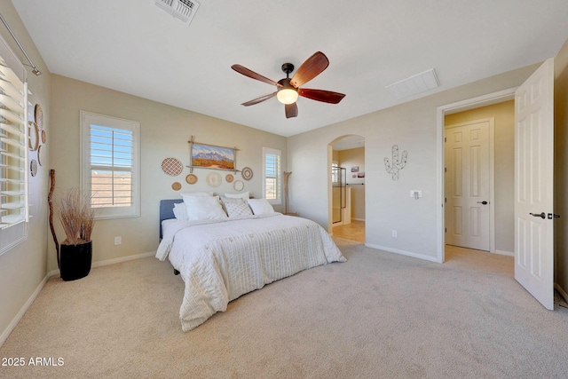 carpeted bedroom featuring ceiling fan