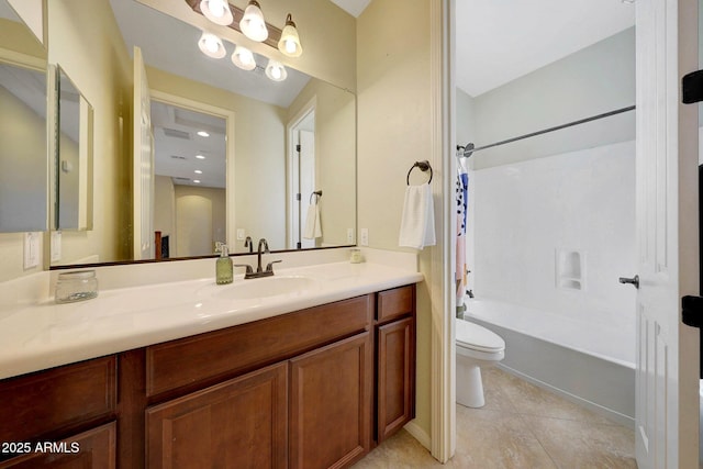 full bathroom with tile patterned flooring, vanity, washtub / shower combination, and toilet