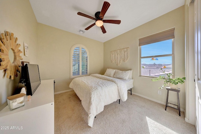 carpeted bedroom with ceiling fan