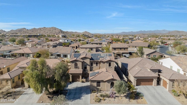 drone / aerial view featuring a mountain view