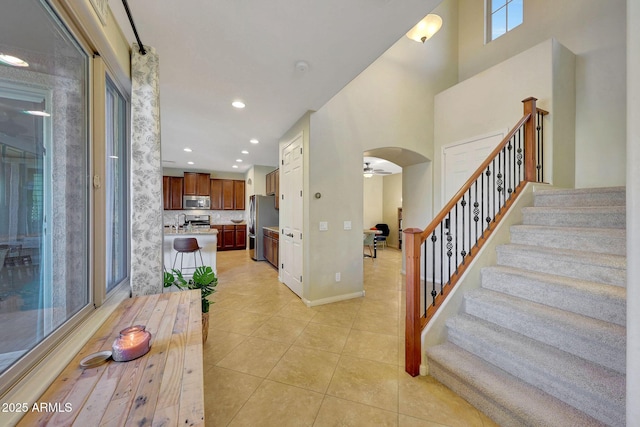 tiled foyer entrance featuring sink