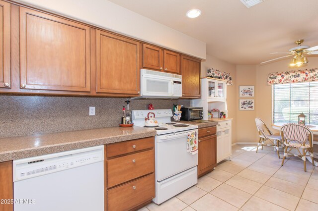 17342 E Quail Ridge Dr, Fountain Hills, AZ 85268 - kitchen with white appliances, light tile patterned flooring, light countertops, decorative backsplash, and ceiling fan