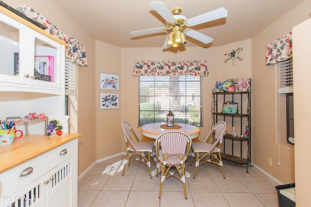 17342 E Quail Ridge Dr, Fountain Hills, AZ 85268 - dining room featuring light tile patterned floors, ceiling fan, and baseboards