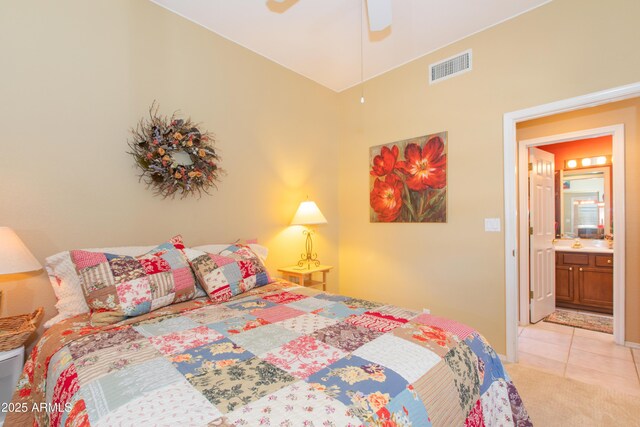 17342 E Quail Ridge Dr, Fountain Hills, AZ 85268 - bedroom with light colored carpet, light tile patterned floors, and a ceiling fan