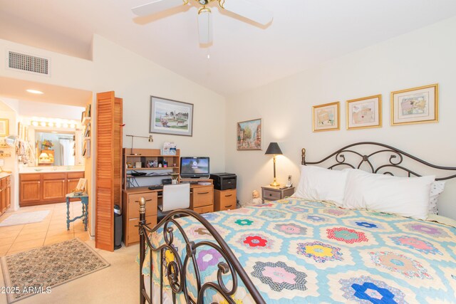 17342 E Quail Ridge Dr, Fountain Hills, AZ 85268 - bedroom featuring lofted ceiling, connected bathroom, light tile patterned flooring, a ceiling fan, and light carpet