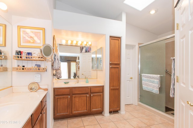 17342 E Quail Ridge Dr, Fountain Hills, AZ 85268 - full bath with lofted ceiling, a shower stall, two vanities, and tile patterned flooring