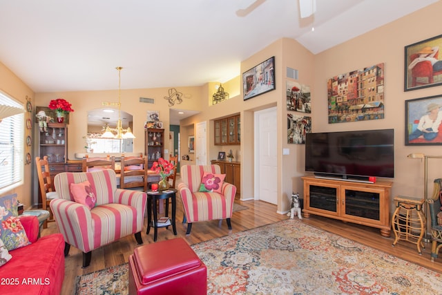 17342 E Quail Ridge Dr, Fountain Hills, AZ 85268 - living room featuring wood finished floors, lofted ceiling, and a ceiling fan