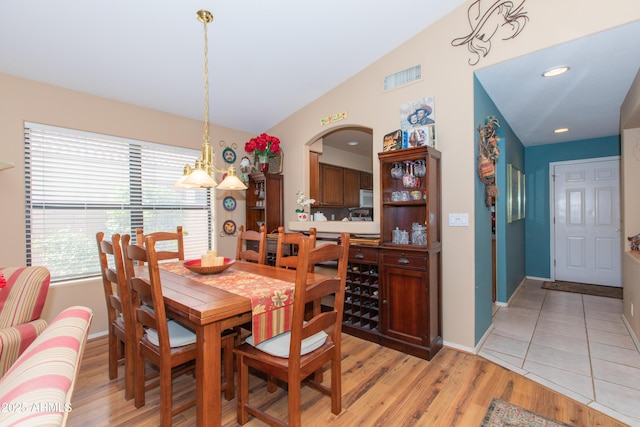 17342 E Quail Ridge Dr, Fountain Hills, AZ 85268 - dining area with light wood-type flooring, baseboards, and a chandelier