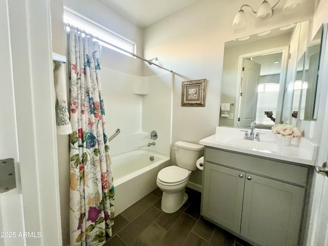full bathroom featuring vanity, toilet, and shower / bath combo