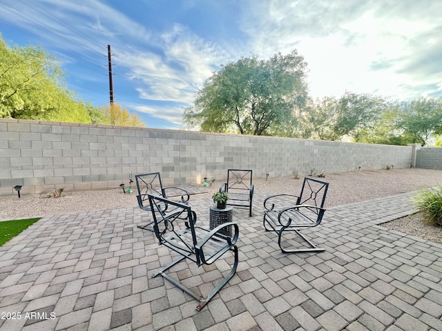 view of patio with a fenced backyard