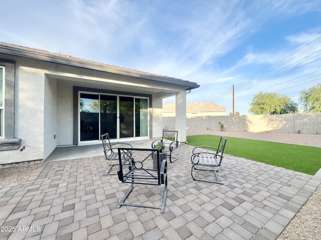 view of patio with a fenced backyard