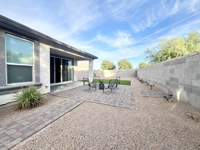 view of patio featuring a fenced backyard