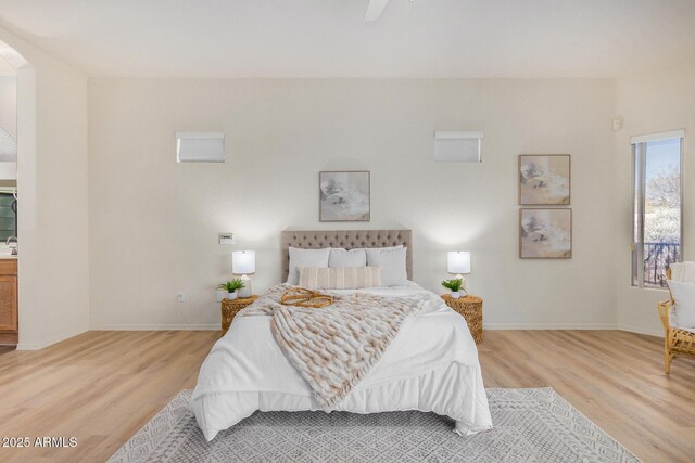 empty room with light wood-type flooring and ceiling fan