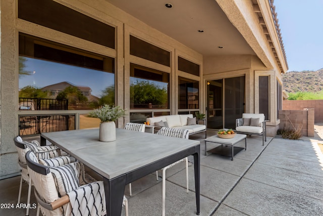 view of patio / terrace with outdoor lounge area and outdoor dining space