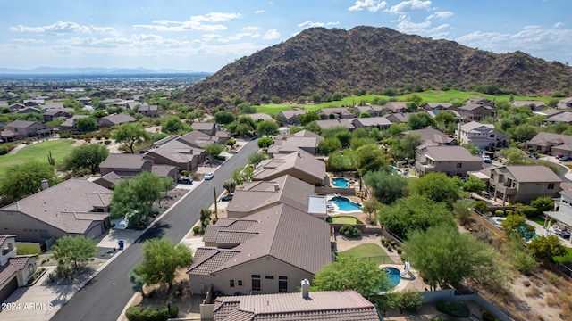 birds eye view of property featuring a mountain view