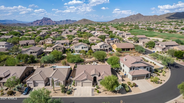 drone / aerial view with a residential view and a mountain view