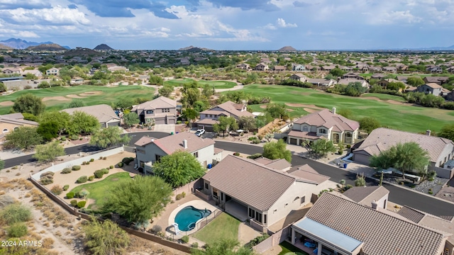 birds eye view of property with a mountain view, golf course view, and a residential view