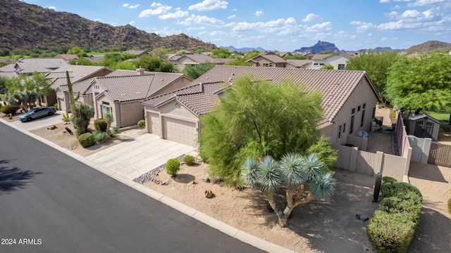 birds eye view of property featuring a residential view and a mountain view