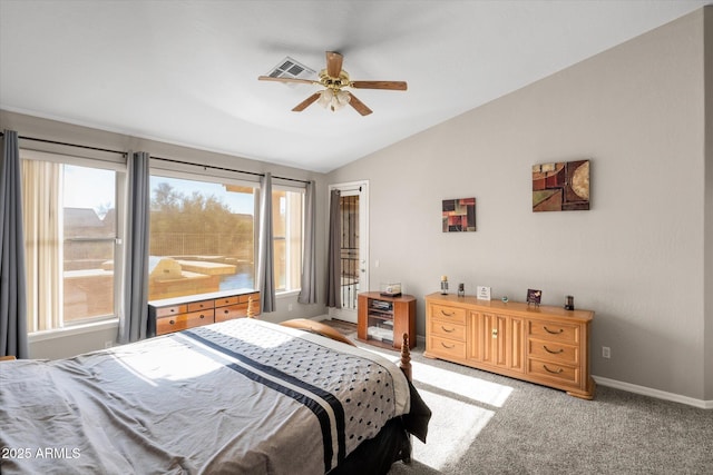 bedroom featuring lofted ceiling, ceiling fan, light carpet, and multiple windows